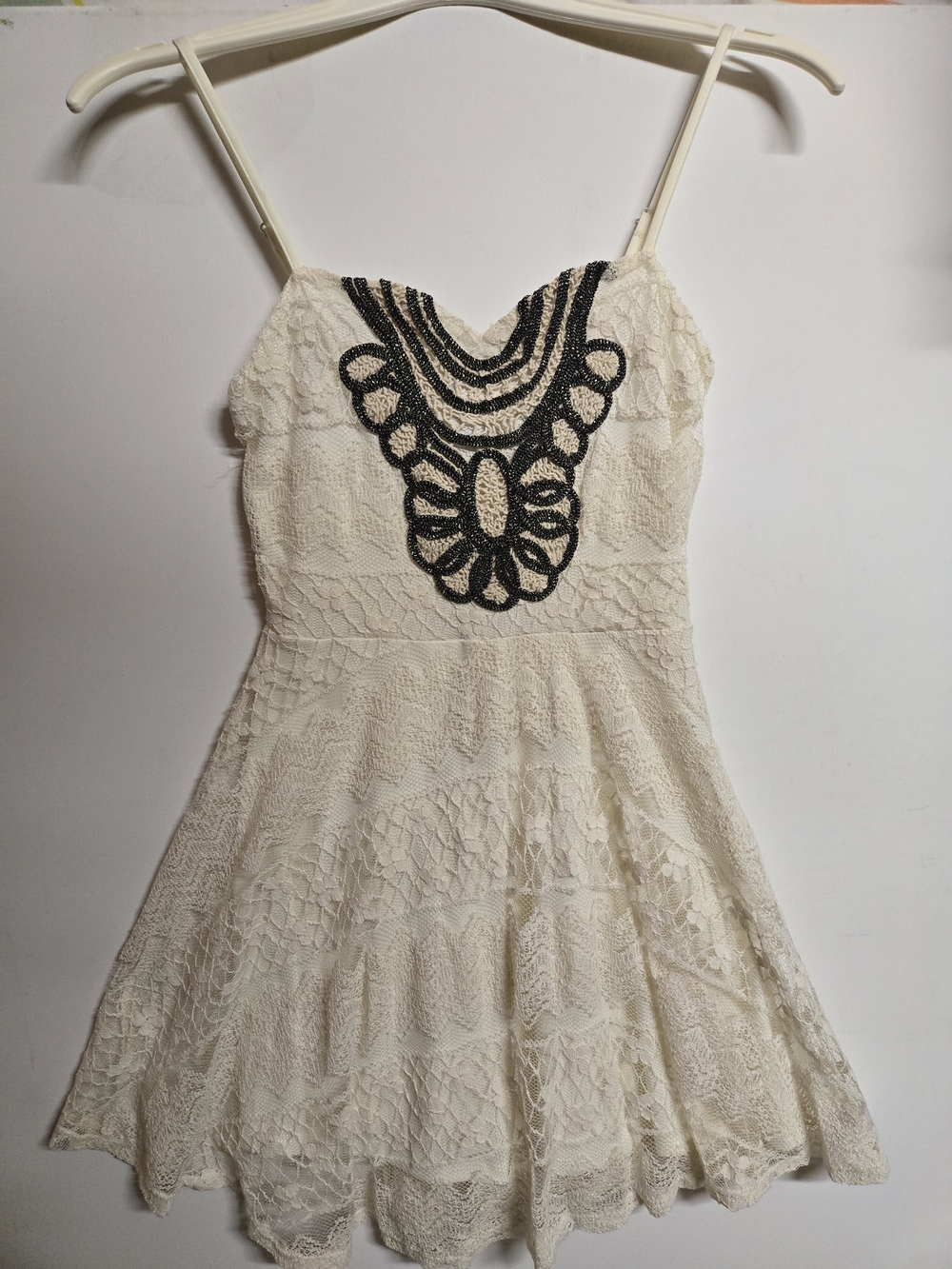 Ivory Lace Mini Dress with Black Beaded Neckline